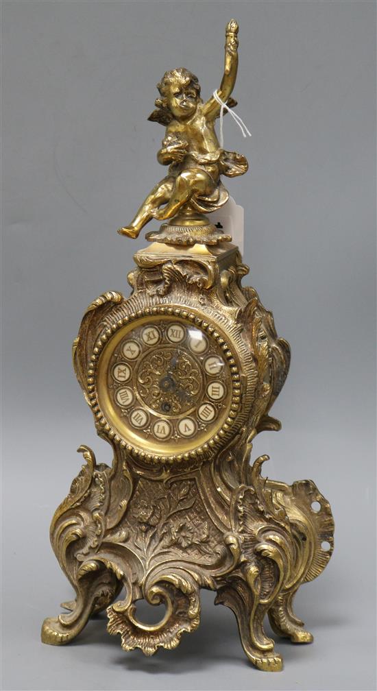 A French ormolu mantel clock, mounted with a cherub height 42cm